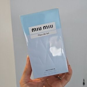 Miu Miu Fleur de Lait Eau de Parfum in Light Blue 1 Fl Oz